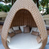 Ghế tổ chim mây nhựa GTC01 với ghế nghỉ dáng giọt nước màu be, lòng ghế rộng và đệm sáng