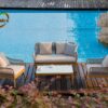 Bàn Ghế Sofa Mây Nhựa MN001 khung gỗ dây rope cạnh hồ bơi