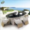 Bàn ghế ăn ngoài trời NT023 bàn oval mặt kính đen và ghế màu sáng